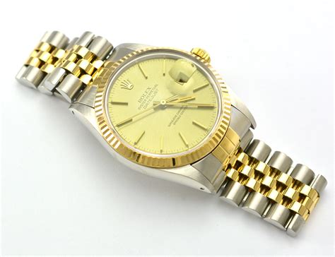 rolex gold fluted bezel.